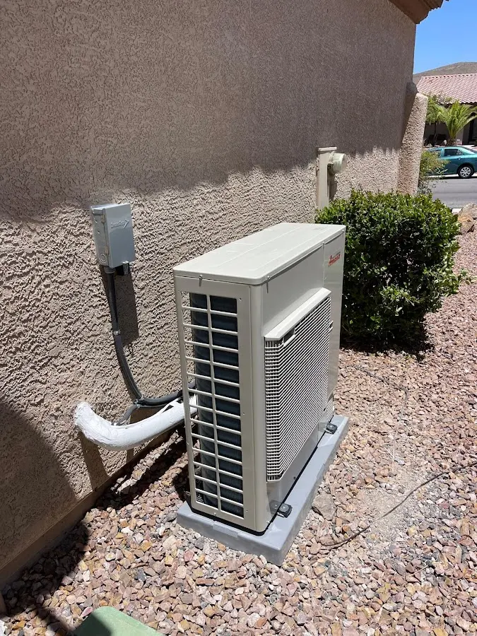 Residential air conditioning condenser unit in Denver